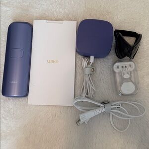 Ulike Purple IPL Hair Removal Device. Like new. Complete w/ original packaging.
